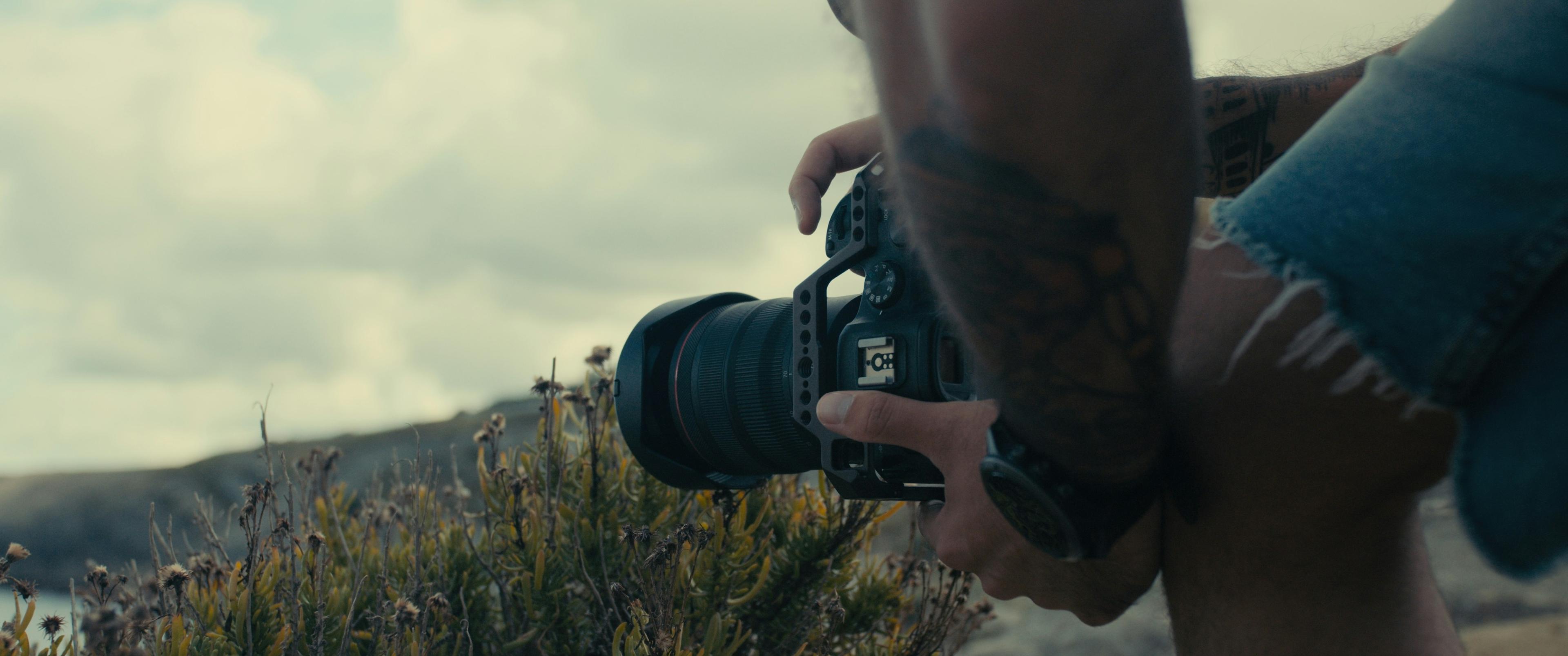 Professional photographer with camera capturing moments